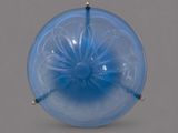 an image of a blue glass object on a gray surface