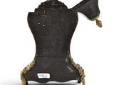 a black chair with a horn on top of it