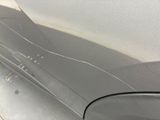a close up of a car ' s side mirror and the door handle