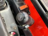 a close up of a car ' s dashboard with a control panel