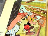 un livre de bandes dessinées sur la couverture duquel figure un homme tenant une épée