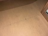 a picture of a bathroom floor with a hole in the floor
