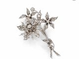 an image of a diamond flower broochle on a white background