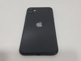 the back of a black iphone with an apple logo on it