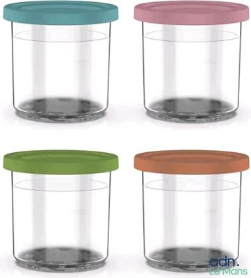 four glass containers with different colors of lids on a white background