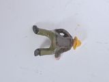 a toy man that is laying down on the floor