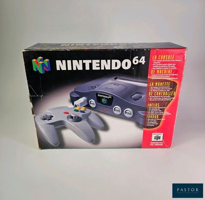 une boîte contenant une manette de jeu, posée sur une table