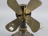 a small fan that is sitting on top of a table