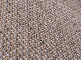 an image of a close up of a rug on the floor