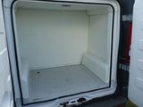 a white van with a door open on the side of the road