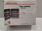 a box with a key cabinet inside of it