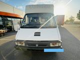 a white van that is parked in a parking lot