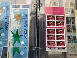 many different types of stickers in a clear box
