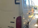 a white van that is parked in a garage