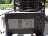 an image of a forklift with a large monitor on it