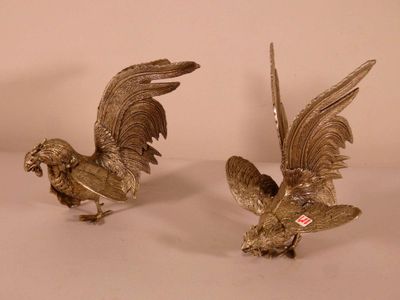 pair of antique silver plated rooster figurines on stand