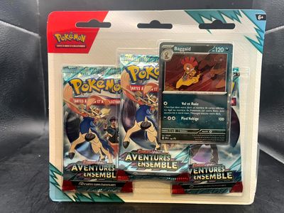 a close up of a box of pokemon cards on a table
