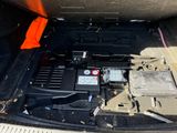 a car battery in the trunk of a vehicle