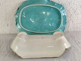 turquoise and white ceramic platter with a large oval serving dish