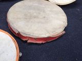 many different types of musical instruments sitting on the floor