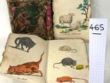 trois vieux livres avec des illustrations de chats et de souris
