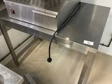 an image of a commercial pizza oven in a commercial kitchen