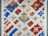 a white handkerchief with red, blue and white flags on it