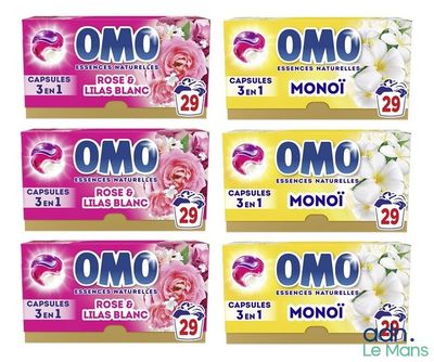 four boxes of omo soap on a white background