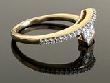 an image of a diamond ring on a reflective surface