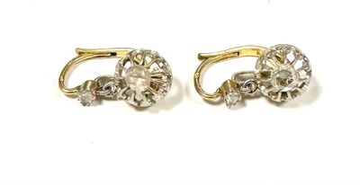 two pairs of gold and diamond earrings on a white background
