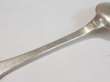a spoon that is sitting on a table