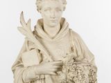 statue of a man holding a bunch of flowers in his hands