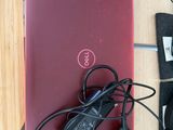 a laptop and headphones sitting on a table