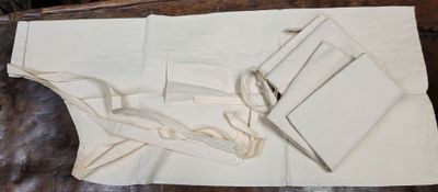 a piece of cloth that has been cut into pieces
