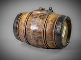 a close up of a wooden barrel on a gray background