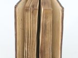 a open book that is sitting on a table