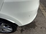 a close up of a car that has been dented