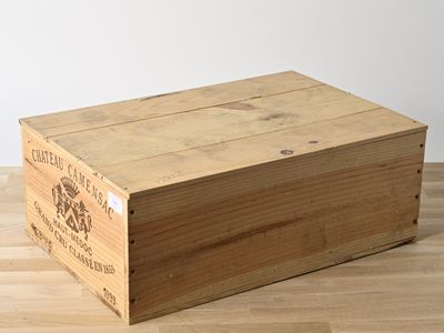 a wooden box that is sitting on a wooden floor