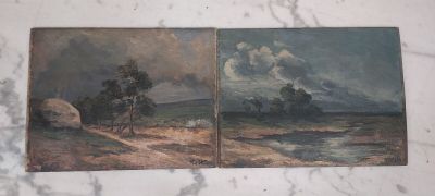 deux tableaux représentant un paysage, posés sur un plateau de table en marbre