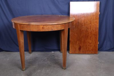 an image of a wooden table with a mirror on top of it
