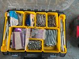 a tool box with screws, screws, screws, and other items in it
