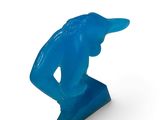 blue sculpture of a man with a hat on his head