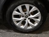a close up of a tire on a car ' s rim