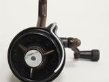 a close up of a black and white spinning machine