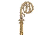 une image représentant une horloge en or sur laquelle figurent un homme et une femme