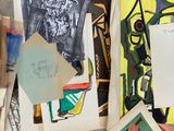 many pieces of art that are on the floor
