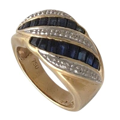 BAGUE en or jaune sertie de saphirs calibrés Poids 9. - Photo 1