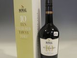 a bottle of wine that is next to a box