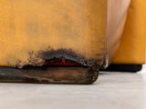 a close up of a piece of wood that has been burnt