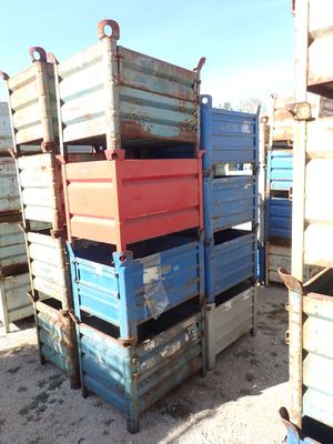 many crates that are stacked on top of each other
